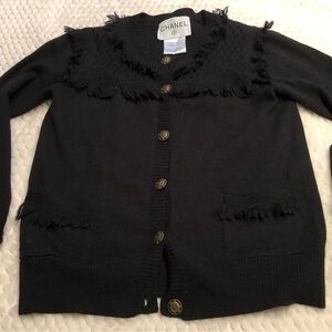 CHANEL Black Cardigan Sweater with Round Neckline and Fringe Detail
